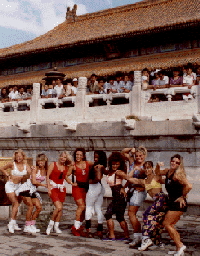 Women bodybuilders posing in the Forbidden City